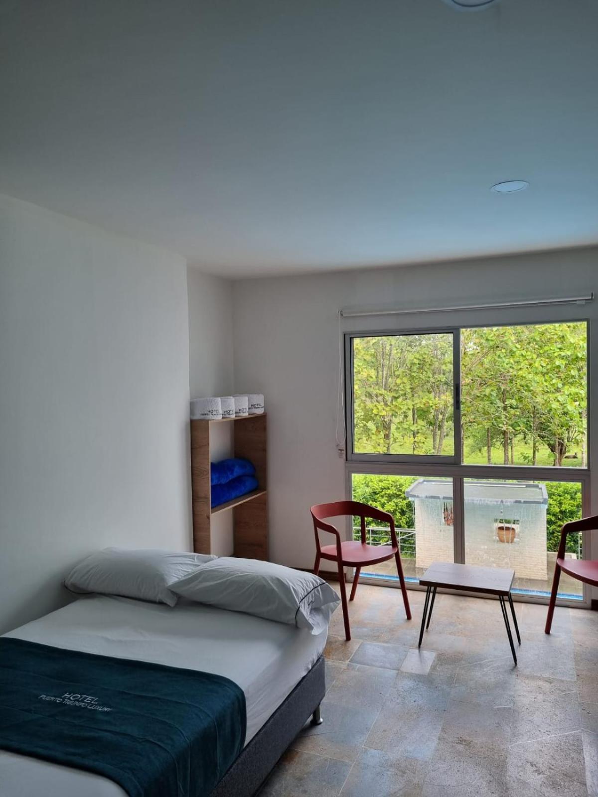 Hotel Puerto Triunfo Doradal Buitenkant foto