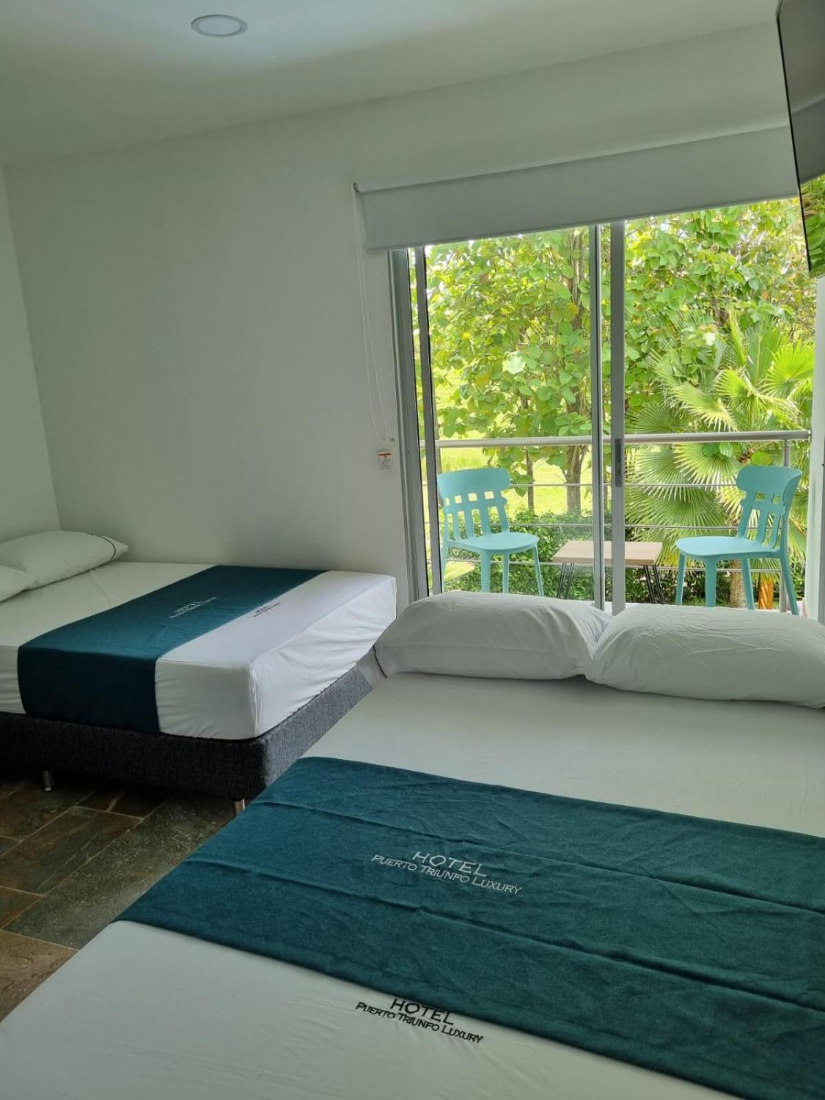 Hotel Puerto Triunfo Doradal Buitenkant foto