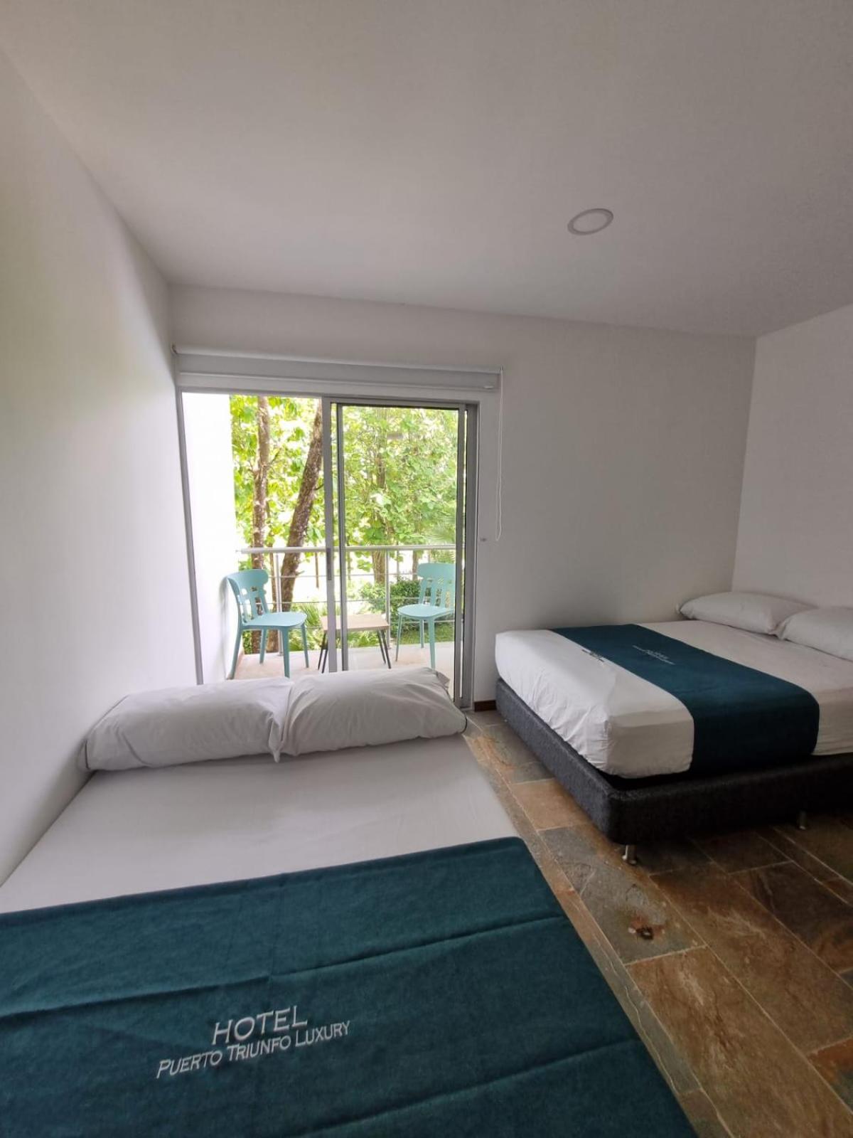 Hotel Puerto Triunfo Doradal Buitenkant foto